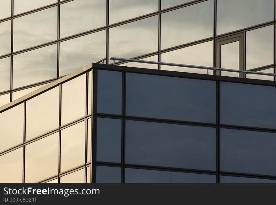 Abstract reflecting windows on large business building