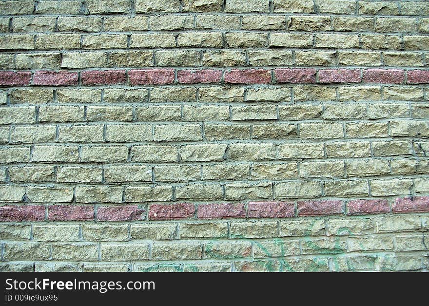 Brick wall, colored rough blocks background