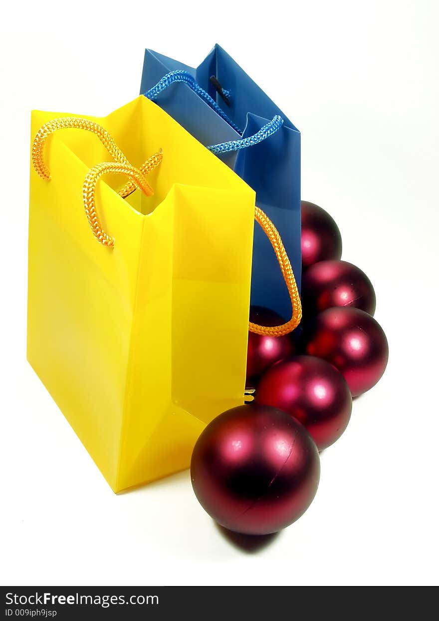 Blue and yellow bags whit red balls