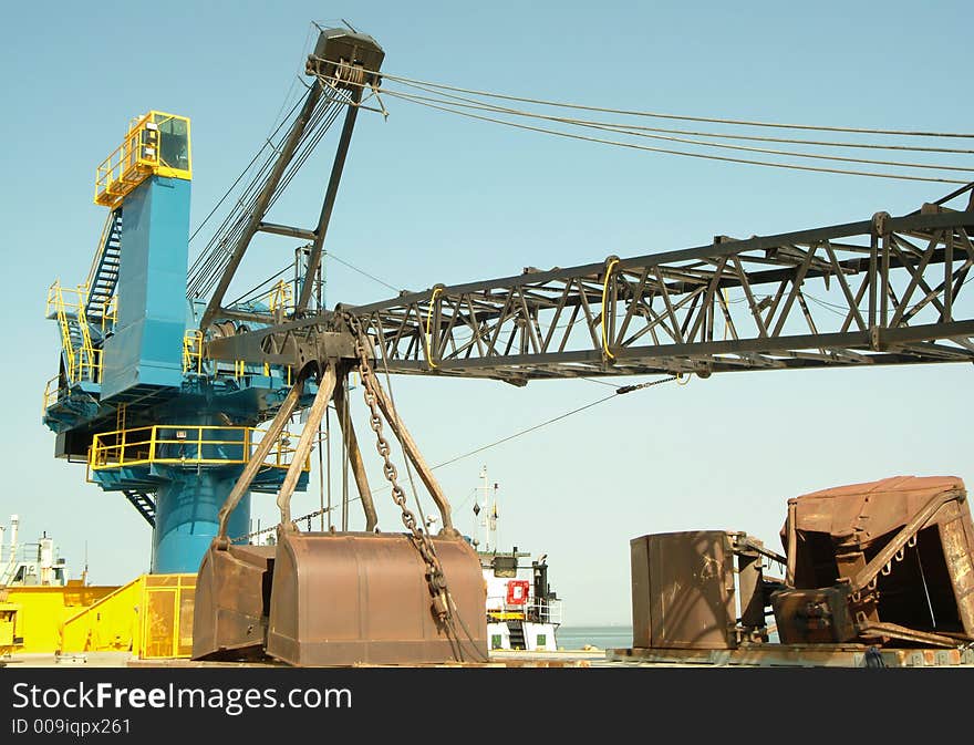 Big crane on ship in port