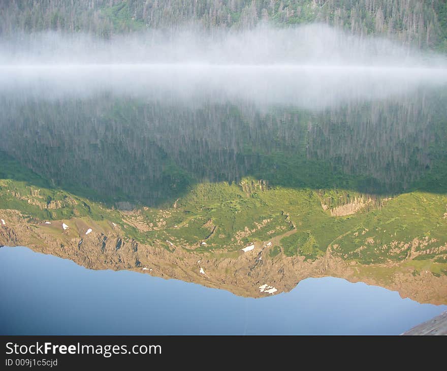 Mountain reflected in lake