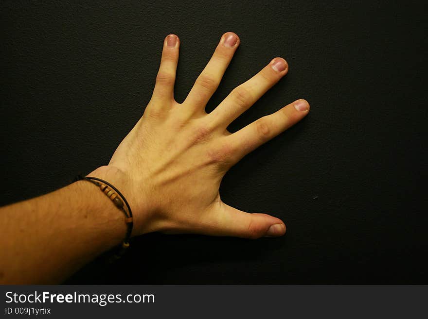 Hand On Black Background