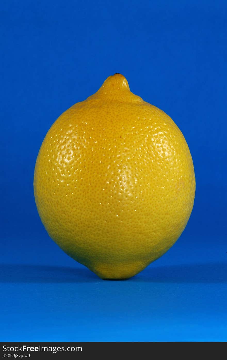 Whole Lemon Over Blue Background