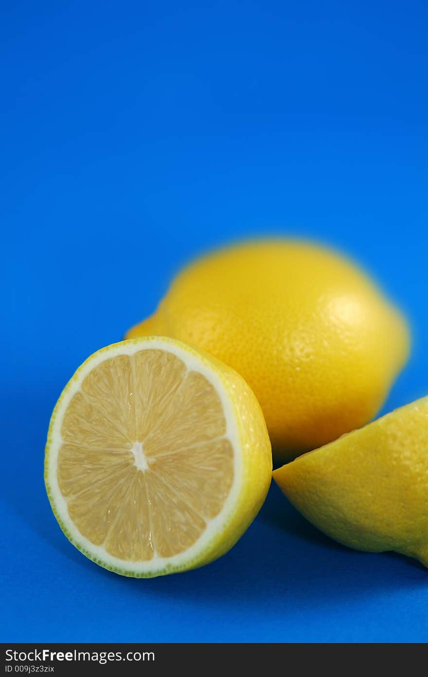 Lemons Over Blue Background. Shallow DOF. Lemons Over Blue Background. Shallow DOF.