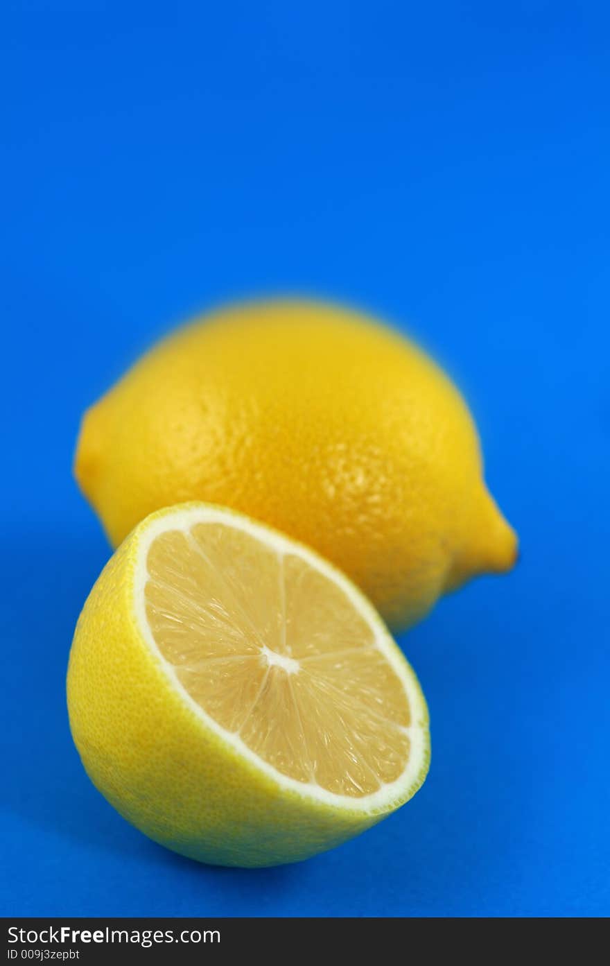 Lemons Over Blue Background. Shallow DOF. Lemons Over Blue Background. Shallow DOF.