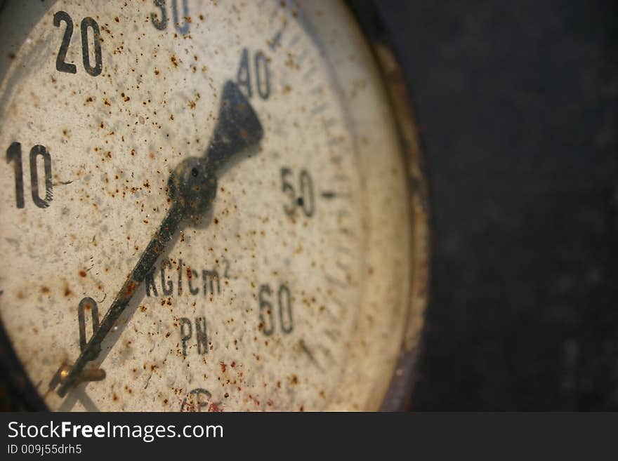 Old broken barometer used in old factory. Old broken barometer used in old factory