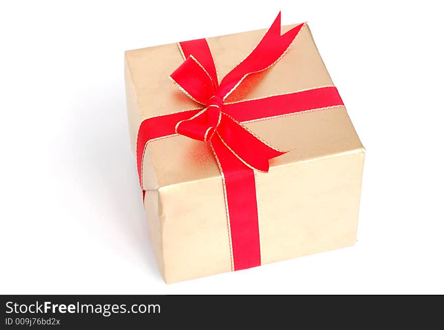 Christmas gift with red ribbon and bow on white background. Christmas gift with red ribbon and bow on white background