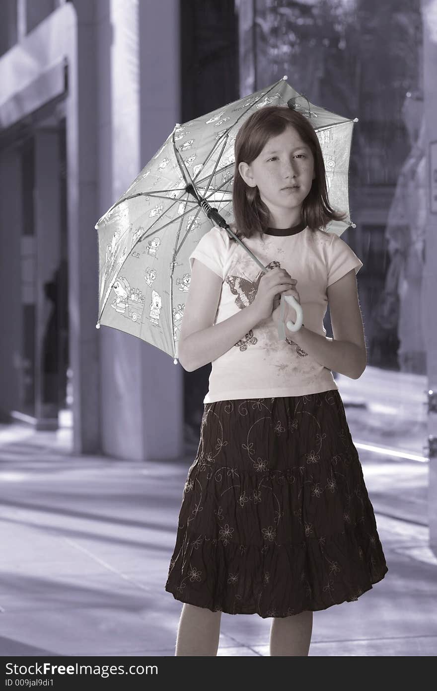 Girl with umbrella standing on the street. Girl with umbrella standing on the street