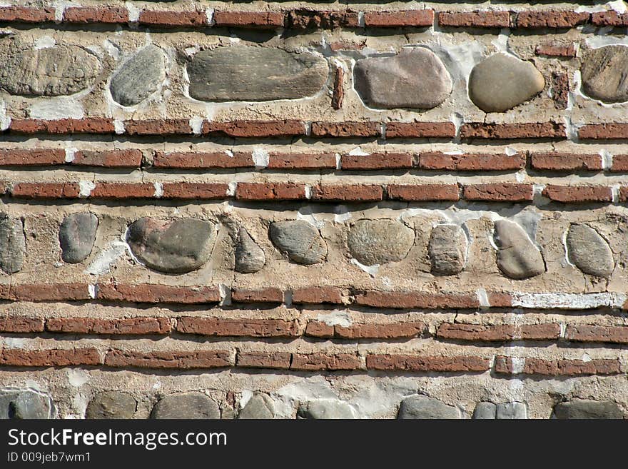 Ancient red brick wall with pattern. Ancient red brick wall with pattern