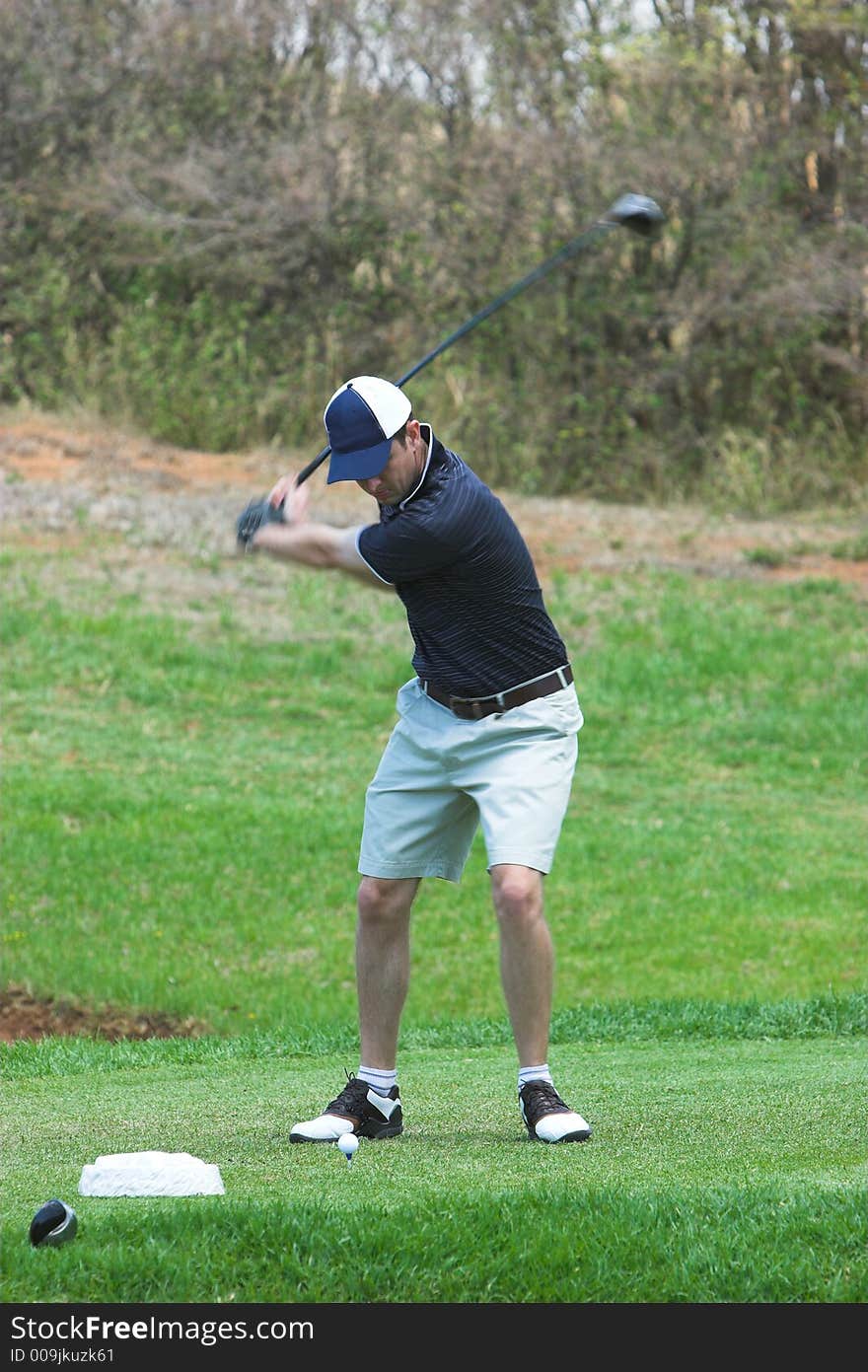 Downswing of a golfer hitting with power. Downswing of a golfer hitting with power