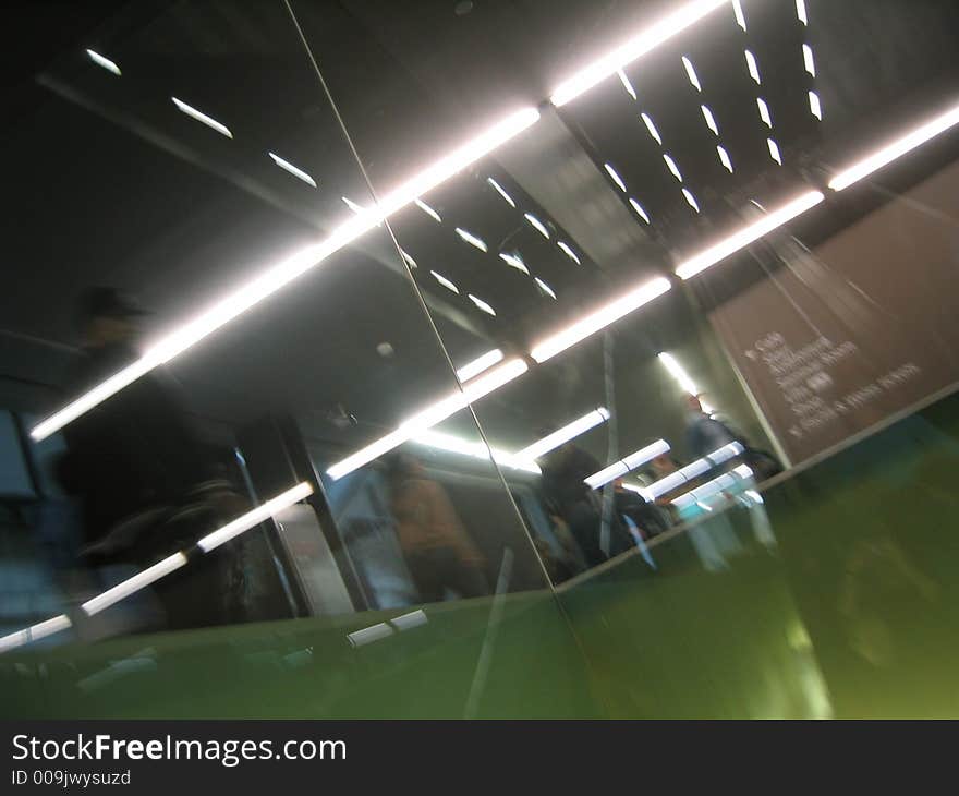 Reflections on stairs, modern architecture building, glass reflections