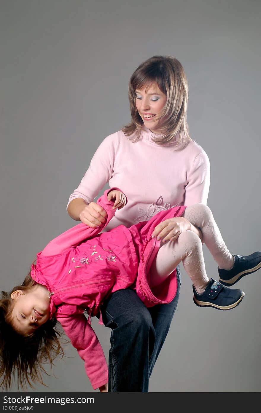 Daughter and her mom playing. Daughter and her mom playing