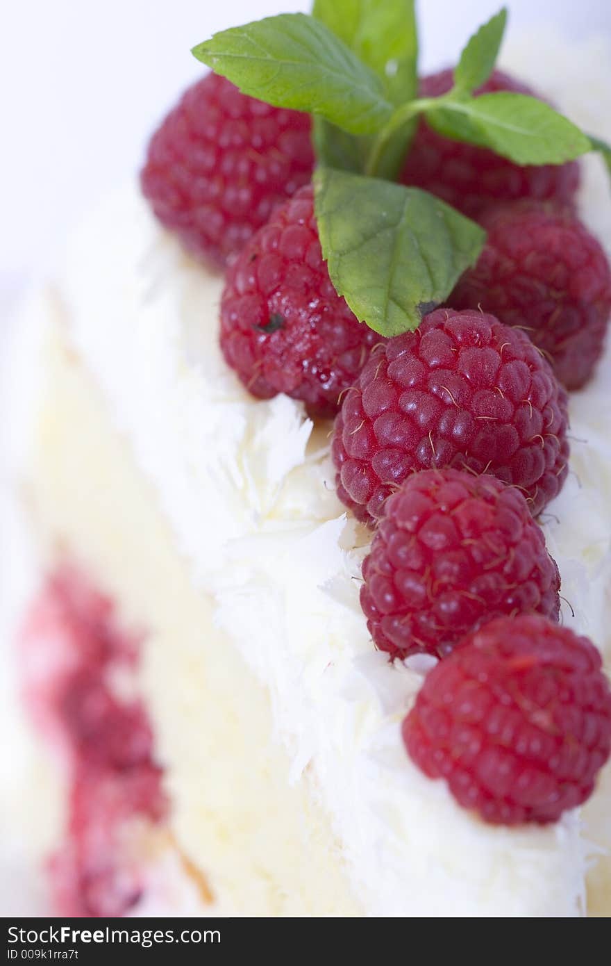 Raspberries atop a light layered dessert. Raspberries atop a light layered dessert