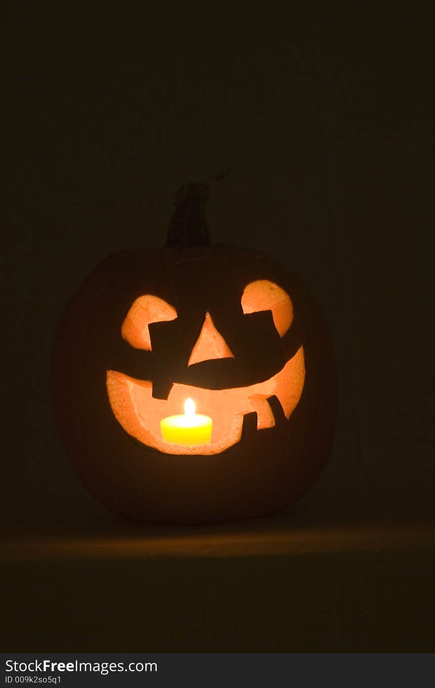 A funny carved pumpkin - good for halloween. A funny carved pumpkin - good for halloween