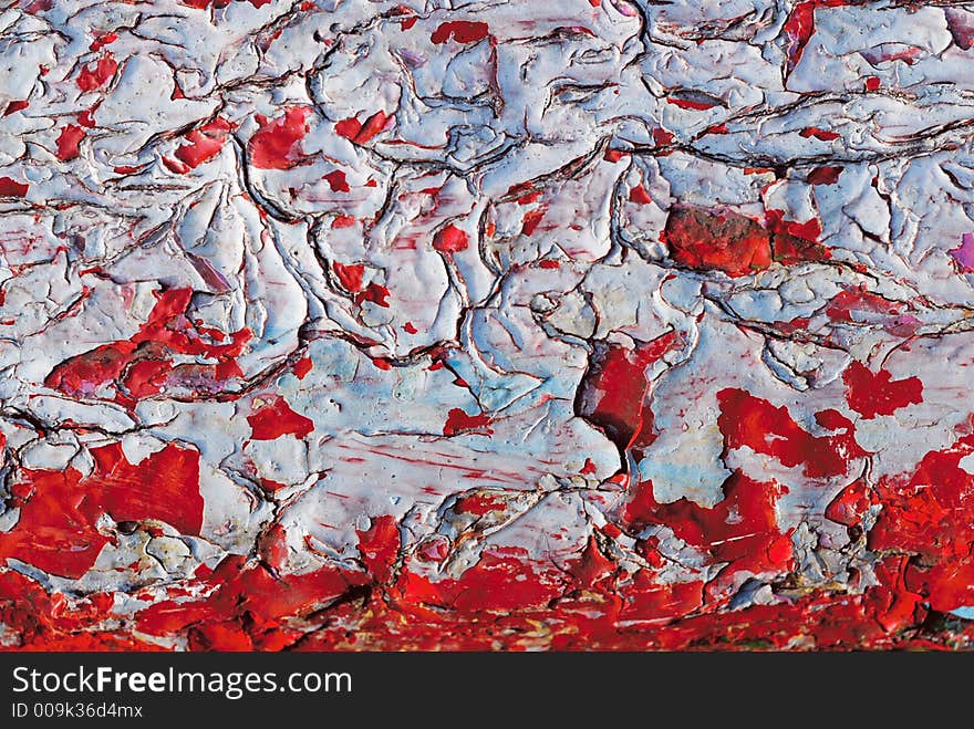 Close-up of dryed red and white paint. Close-up of dryed red and white paint