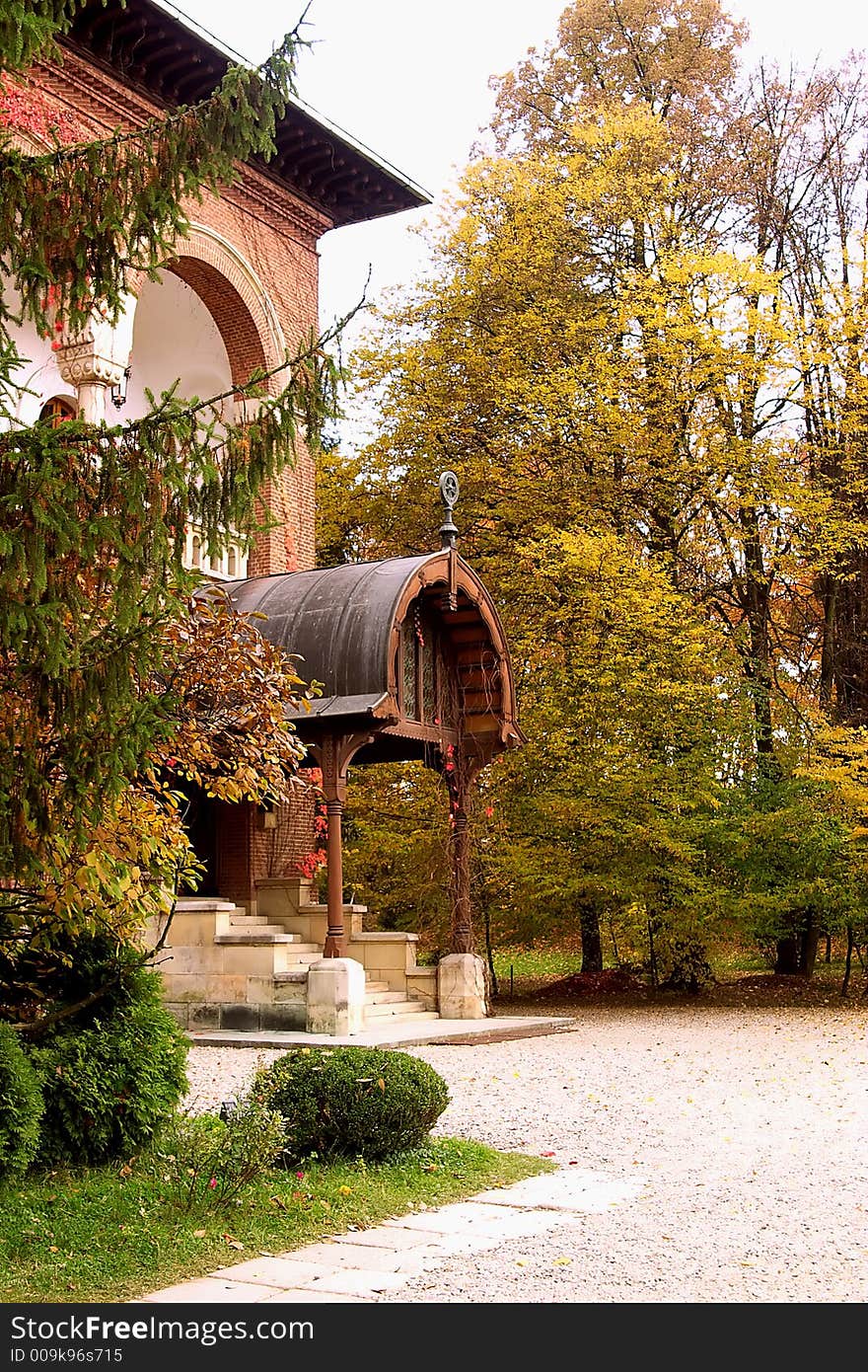 PAth to entrance of the brick house in Curtea de Arges Monastery park - Romania. An imppresive relgious monument finished in 7 january 1517 by Neagoe Basarab