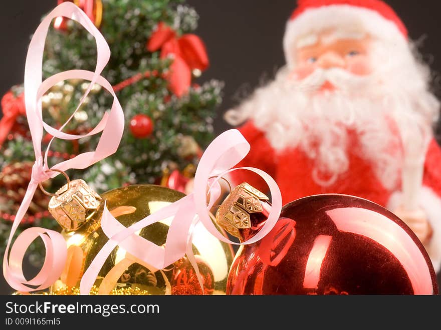 Santa with Christmas decoration on the Christmas tree background. Santa with Christmas decoration on the Christmas tree background