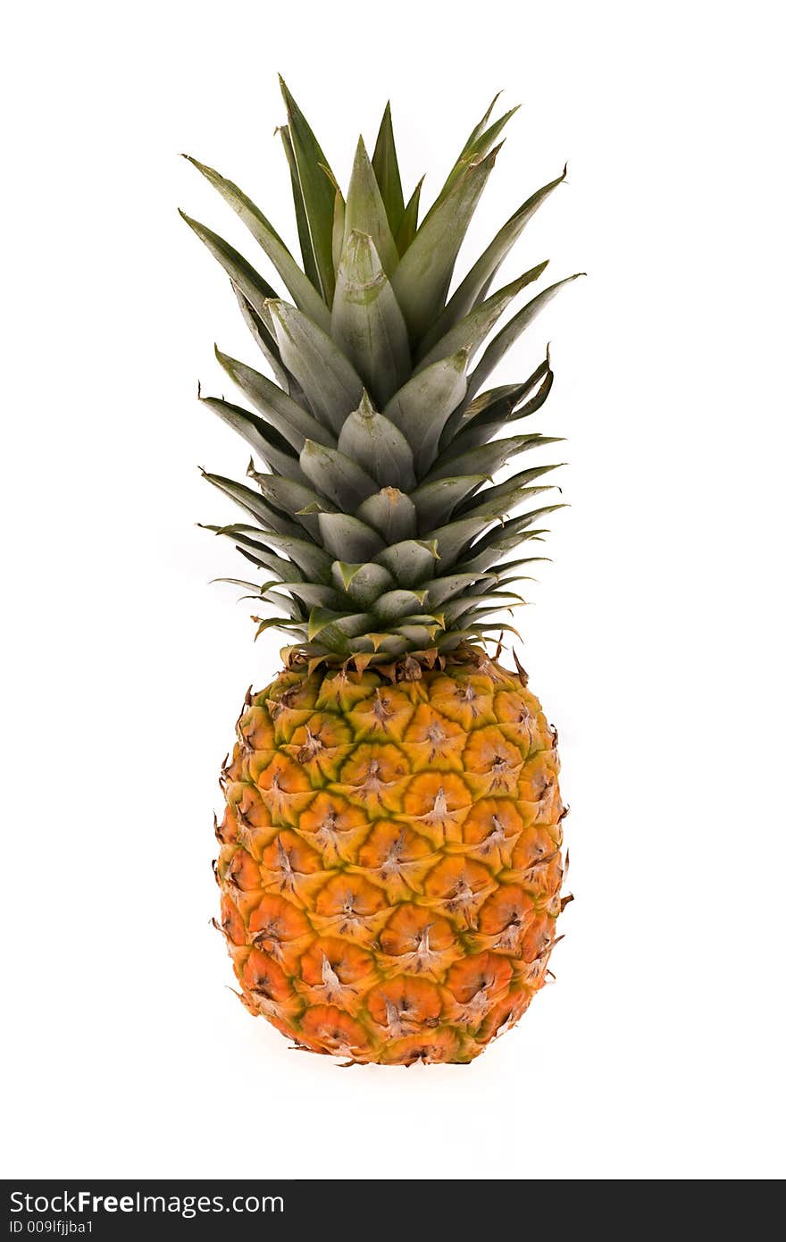 Pineapple infront of white background .