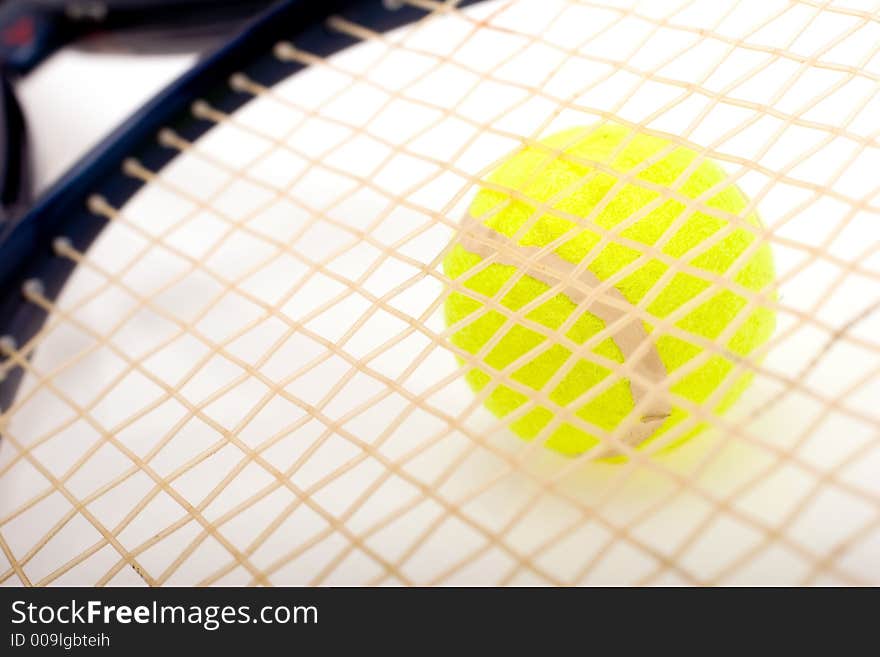 A racquet and tennis ball composition .