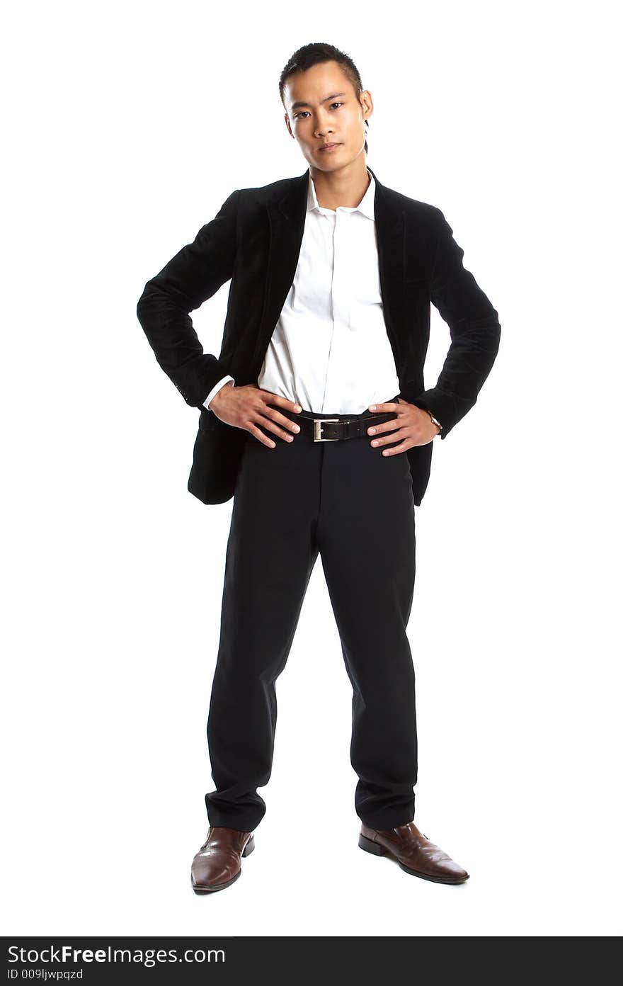 Great looking asian businessman shot in studio - serious. Great looking asian businessman shot in studio - serious