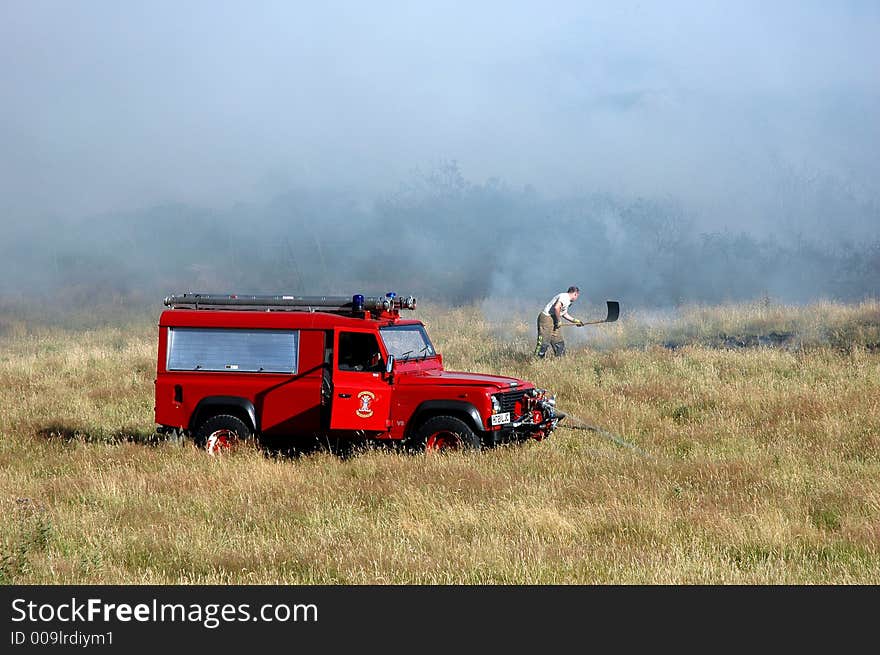 A north wales fire service tender attending a gorse fire on conwy mountain, north wales.