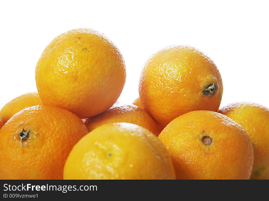 Stack of clementines isolated on white background