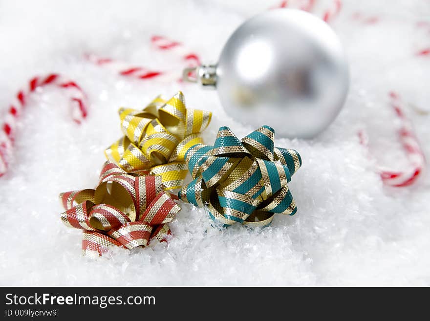 A christmas setting complete with snowflakes and candycanes