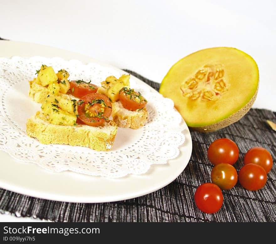 Vegetarian melon and tomato appetizer. Vegetarian melon and tomato appetizer