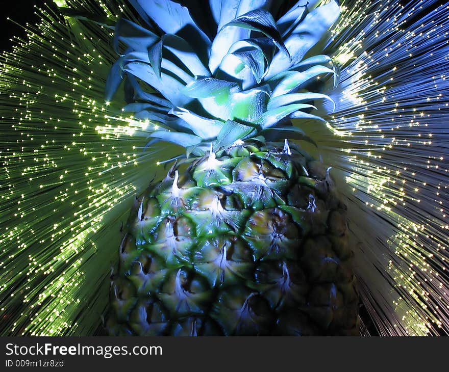 Pineapple in a stream of particle. Pineapple in a stream of particle