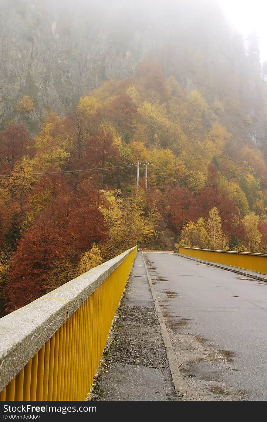 Bridge to mist in Transfagasan climbing at 2034 m high in Fagaras Mountains