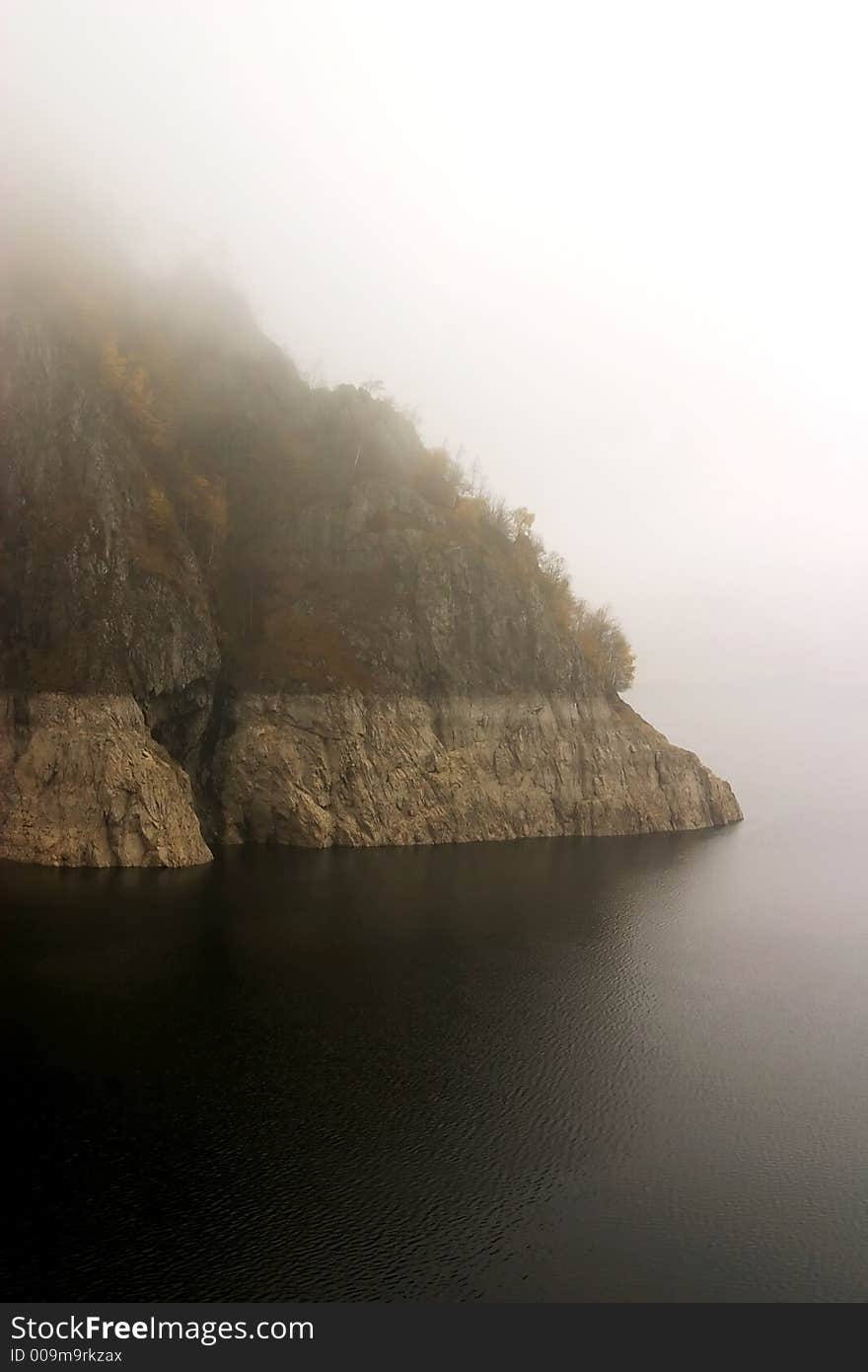 Lake coast in fog at Vidraru Dam - Romania, 166 m hight, 465 millions mc, build in 1966