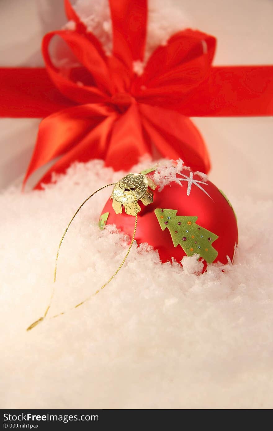 Red Christmas ball lying in the snow. Red Christmas ball lying in the snow