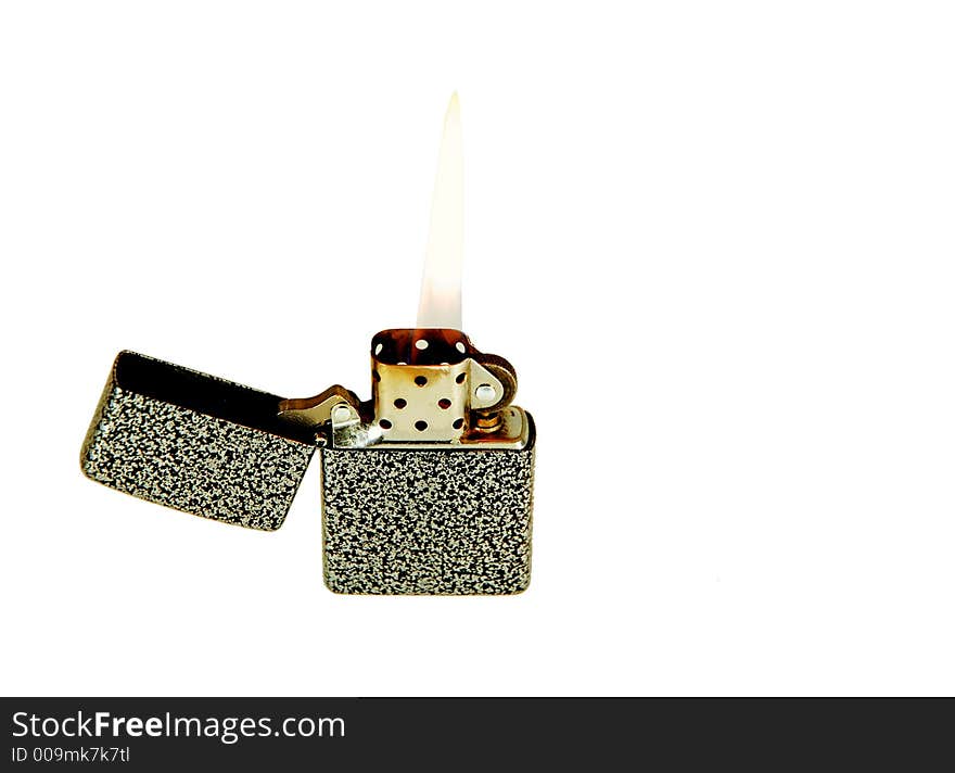 Lit lighter with gunmetal finish.