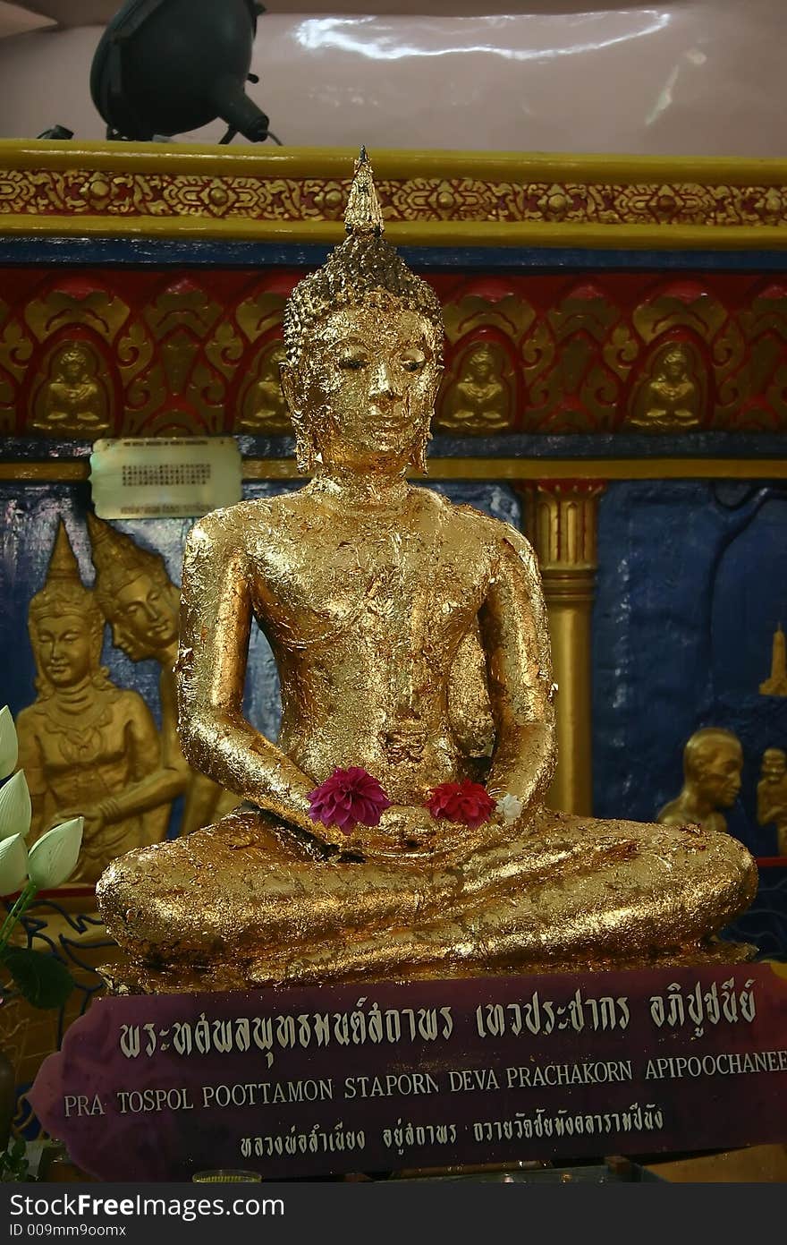 Statue in Penang Reclining Buddha Temple, Malaysia. Statue in Penang Reclining Buddha Temple, Malaysia.