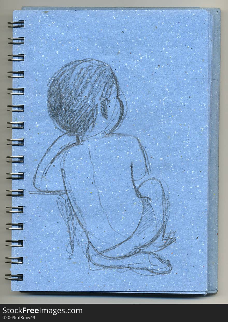 A drawing of child hand drawn with grey pencil on a blue sketchbook. A drawing of child hand drawn with grey pencil on a blue sketchbook