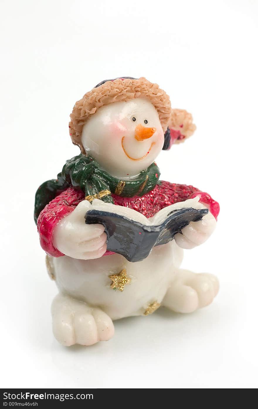 Miniature Snowman statues in different poses against white background with clipping paths. Miniature Snowman statues in different poses against white background with clipping paths