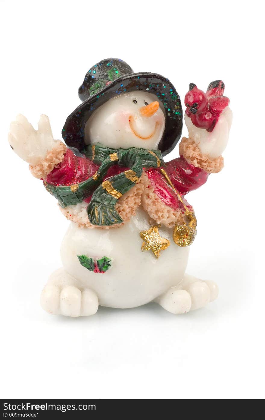 Miniature Snowman statues in different poses against white background with clipping paths. Miniature Snowman statues in different poses against white background with clipping paths