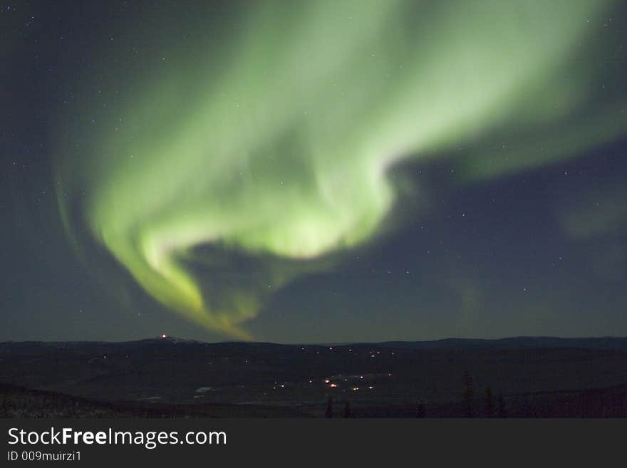 Active arc of northern lights in the night sky. Active arc of northern lights in the night sky