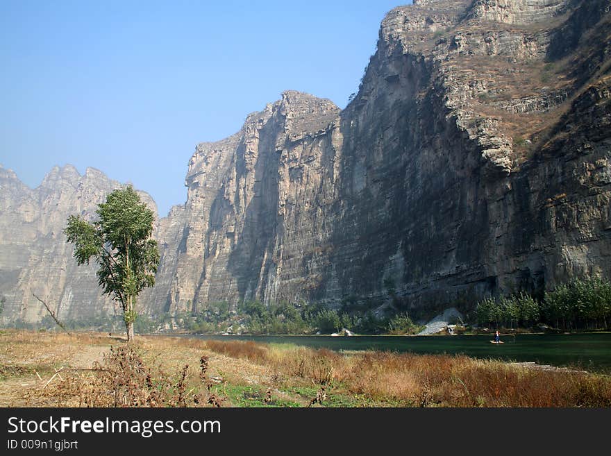 Landscape of mountain,land,river and clear sky in autumn. Landscape of mountain,land,river and clear sky in autumn