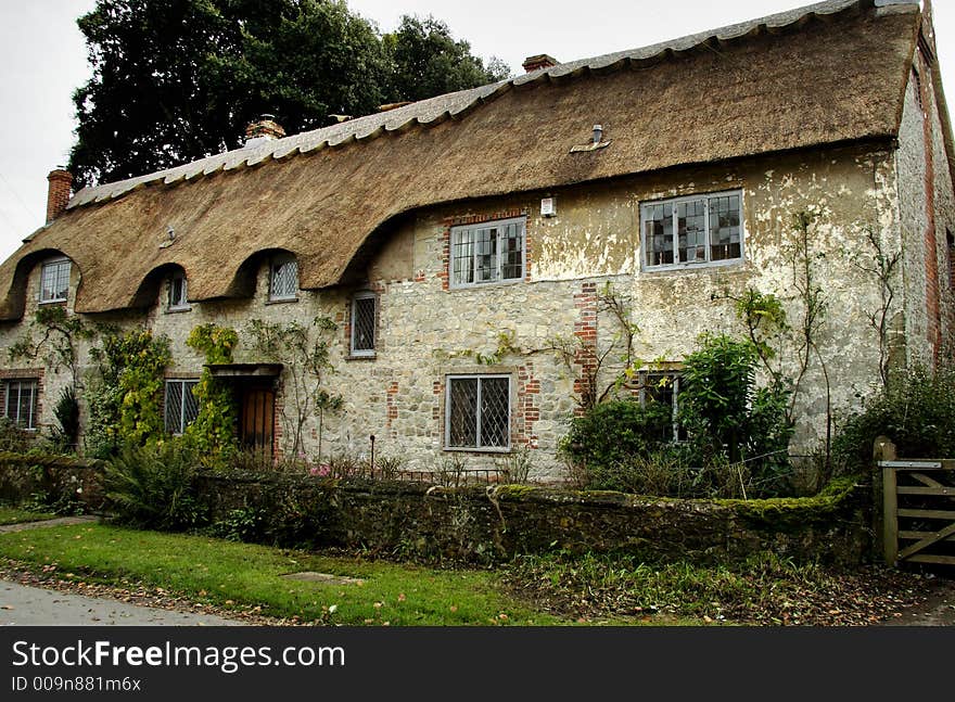 Thatched House in a Rural Village in England. Thatched House in a Rural Village in England