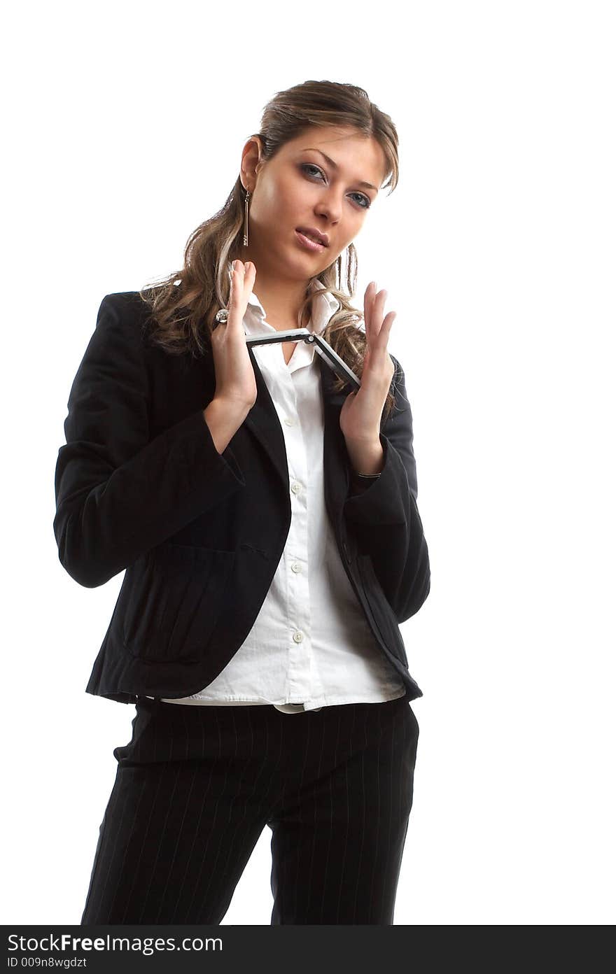 Great looking blond business woman shot in studio - with cell. Great looking blond business woman shot in studio - with cell