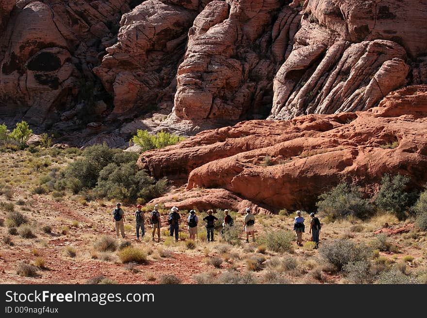 Group of hikers at the red rocks