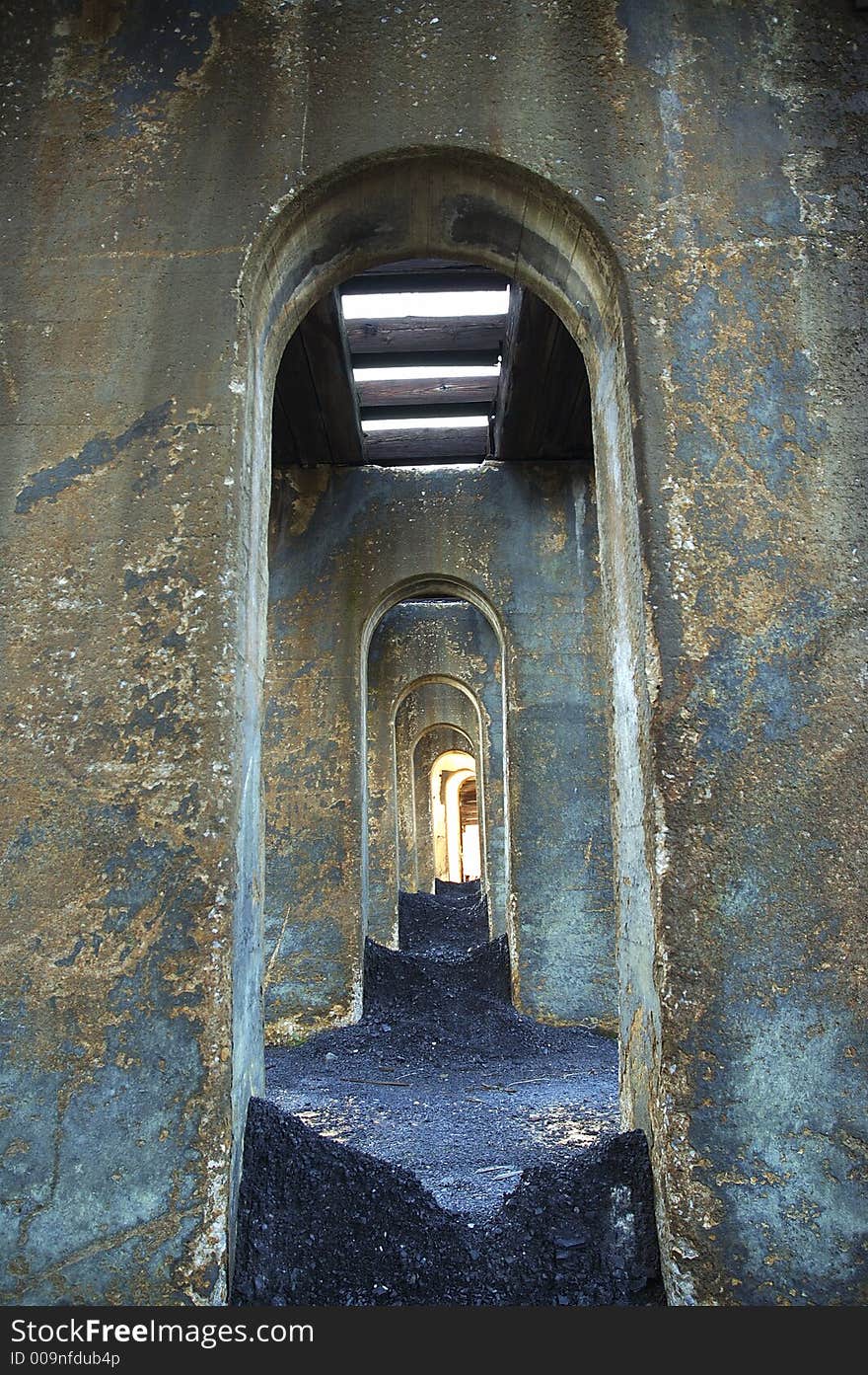 Arches underneath a train bridge