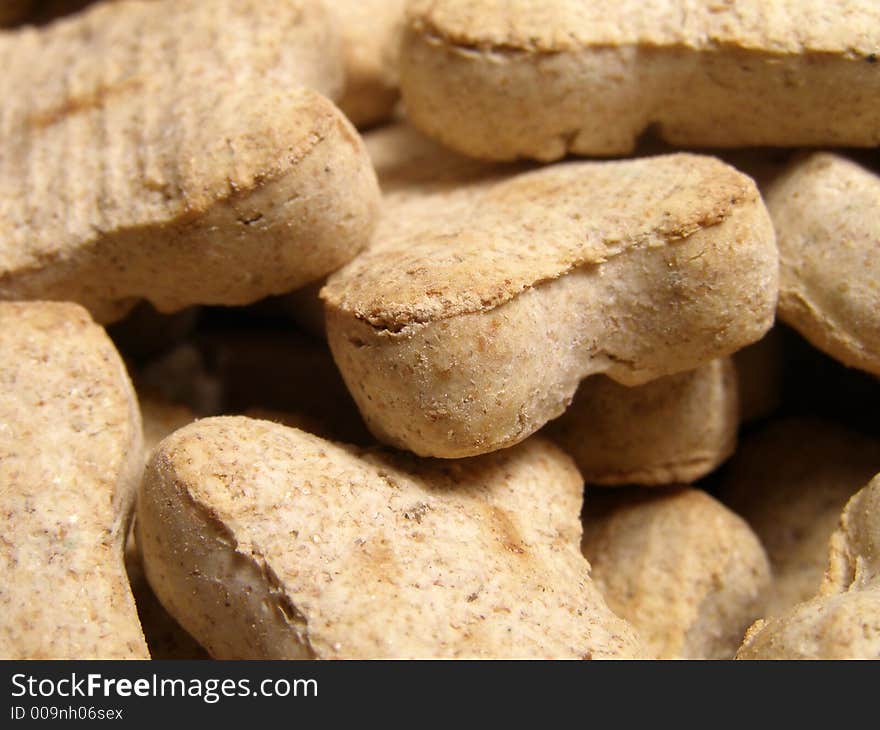 Detail close-up of dog cookies piled high. Detail close-up of dog cookies piled high.