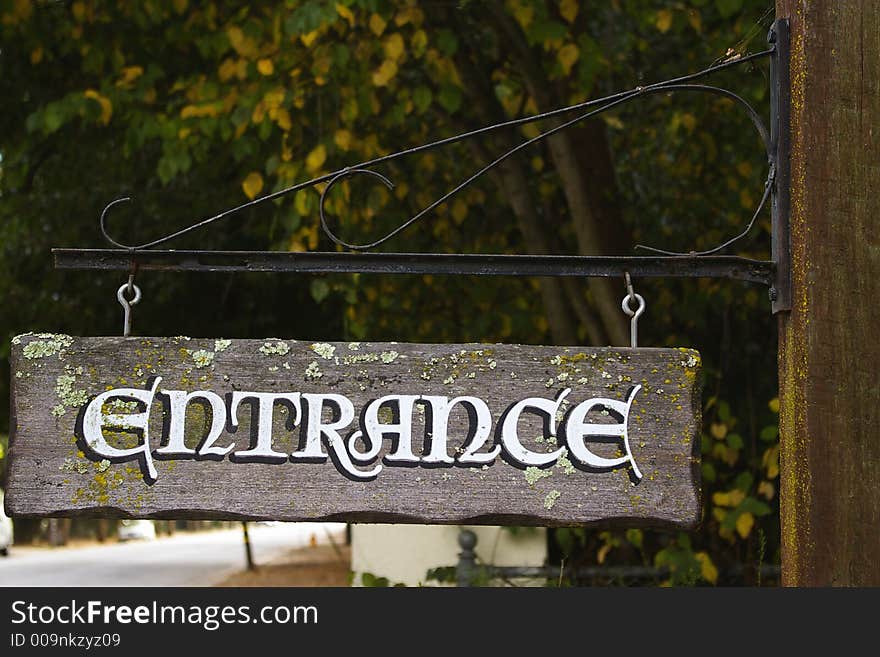 Vintage entrance road sign in suburban area