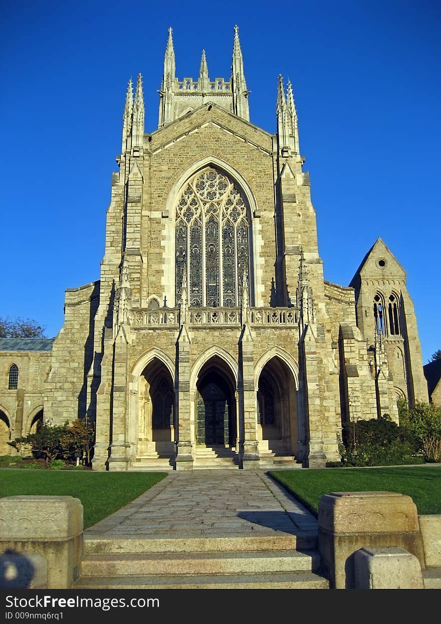 Facade of a magnificent gothic cathedral on a sunny day. Facade of a magnificent gothic cathedral on a sunny day.