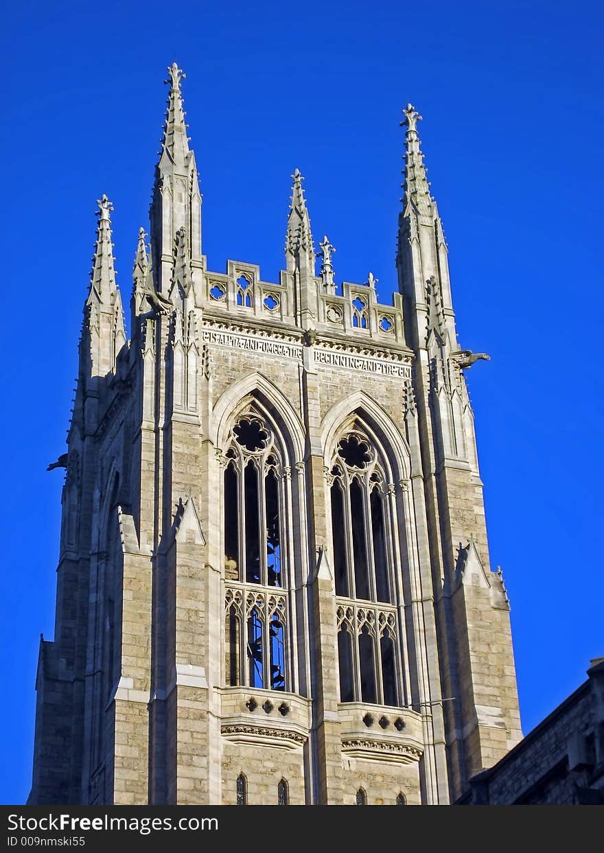 Tower of a Magnificent Gothic Cathedral on a Sunny Day. Tower of a Magnificent Gothic Cathedral on a Sunny Day