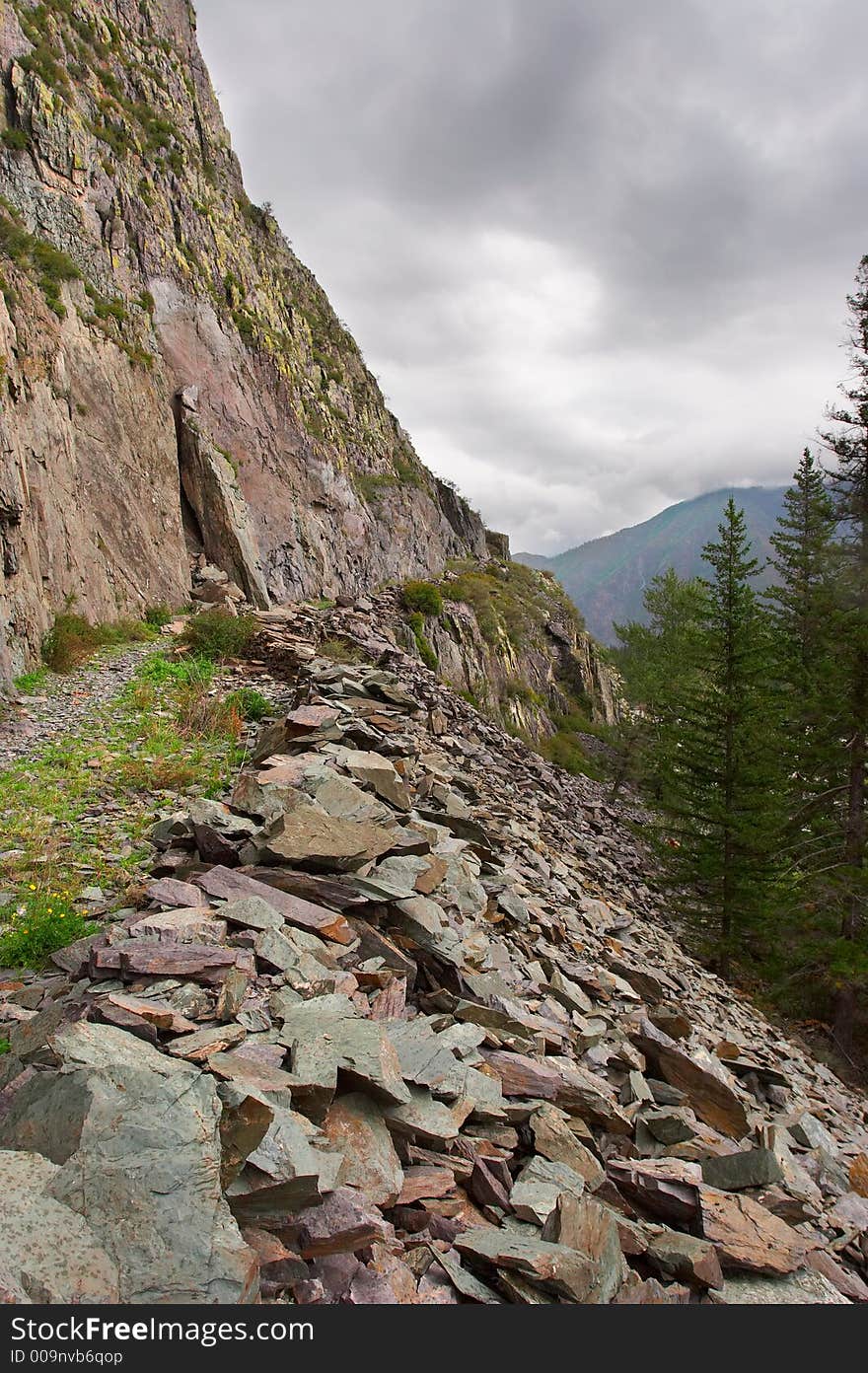 Road, mountains and clouds. Altay. Russia.