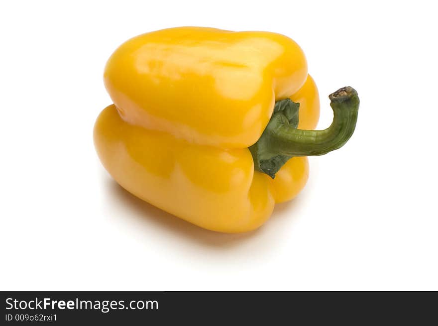 Yellow pepper on white background