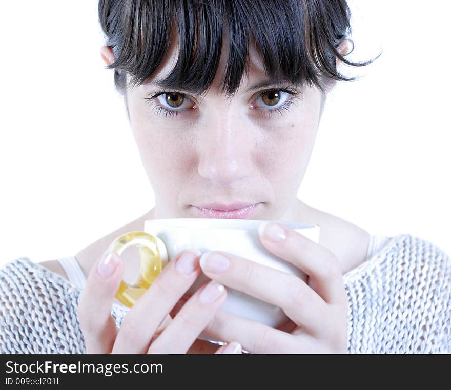 Young smiling woman with a coffee cup